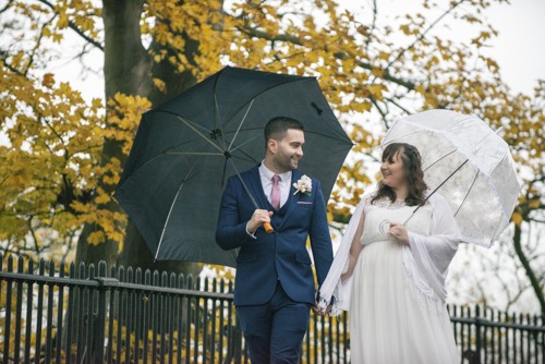 Photograph of Toby & Elizabeth Whittington walking hand in hand